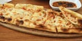 Khachapuri on wooden board