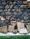Khachkars along wall in Sevanavank Sevan Monastery Royalty Free Stock Photo