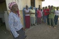 Khadija Rama, standing with a group of people, is the founder of Pepo La Tumaini Jangwani, HIV/AIDS Community Rehabilitation Royalty Free Stock Photo