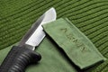 Khaki Color Military Sweater With Army Sign And Kombat Knife Royalty Free Stock Photo