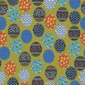 Khaki green with decorated easter eggs seamless pattern background design. Royalty Free Stock Photo