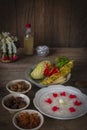 Khao-Chae, Cooked Rice Soaked in Iced Water in the white bowl and Eaten with the Usual Complementary Food and to decorate by Royalty Free Stock Photo