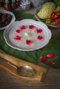 Khao-Chae, Cooked Rice Soaked in Iced Water in the white bowl and Eaten with the Usual Complementary Food and to decorate by Royalty Free Stock Photo