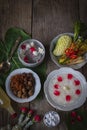 Khao-Chae, Cooked Rice Soaked in Iced Water in the white bowl and Eaten with the Usual Complementary Food and to decorate by Royalty Free Stock Photo