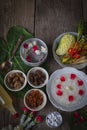 Khao-Chae, Cooked Rice Soaked in Iced Water in the white bowl and Eaten with the Usual Complementary Food and to decorate by Royalty Free Stock Photo