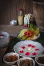 Khao-Chae, Cooked Rice Soaked in Iced Water in the white bowl and Eaten with the Usual Complementary Food and to decorate by Royalty Free Stock Photo