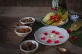 Khao-Chae, Cooked Rice Soaked in Iced Water in the white bowl and Eaten with the Usual Complementary Food and to decorate by Royalty Free Stock Photo