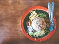 Khao kluk kapi Shrimp Paste Fried Rice on the wooden table