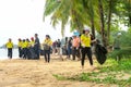 Khao Lak, Thailand, 1 june 2019: Asian kids Teens schoolchildren and boy scouts volunteers, girls and boys, clean up trash and