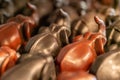 Khao Lak, Thailand, June 25, 2019: a herd of elephants family goes to the water-toys Souvenirs are on the shelves of a