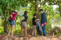 Khao Lak, Thailand, 1 june 2019: People of different nationalities cleaning garbage on the black beach to clean the beach in the