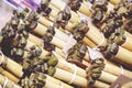 Khao lam, sticky rice cooked with coconut milk and soybean in a bamboo tube