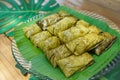 Khao tom mad or steamed mung bean with sticky rice is the local and trandition Thai dessert. It`s wraped by banana leaf Royalty Free Stock Photo