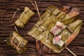 Khao Tom Mat - Thai dessert - Sticky Rice, Banana and Black Beans Wrapped in Banana leaf