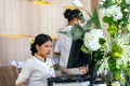 Khaoak, Thailand, 20 july 2019: the hotel Manager, a girl, works at the computer. Modern luxury hotel in Thailand. reception