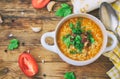 Kharcho soup, rice, beef, tomatoes, herbs, in white bowl, pita b