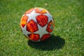 Kharkiv, Ukraine - August 7, 2019: Ball for matc of UEFA Womens league championes. Logo of UCL, Final in Madrid 19. Green grass