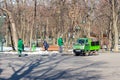 Kharkiv Ukraine, February 21, 2020: Utility workers cleaning the alley of the city park