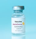 Kharkiv. Ukraine. January 9, 2021. Coronavirus vaccine vial with AstraZeneca logo a blue background.The concept of medicine, Royalty Free Stock Photo