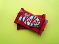 KHARKIV, UKRAINE - JANUARY 2, 2021 Kit Kat by Nestle chocolate covered wafer on bright color