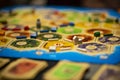 Kharkiv, Ukraine - January 05 2018: The Settlers of Catan board game, ongoing multiple player game. Settlement in focus Royalty Free Stock Photo