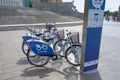 Kharkiv, Ukraine, July, 2017 Bike sharing dock station. City bicycle parking point powered by solar cell panels. Urban mobility Royalty Free Stock Photo