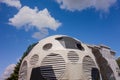 Kharkiv, Ukraine, July, 2019 Football ball installation near sport complex and stadium. City landscape in summer day. Decorated