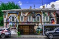 Old house with a beautiful modern mural on the wall in Kharkov Kotsarska street 36/38. Royalty Free Stock Photo