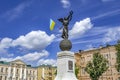 Statue `Flying Ukraine` by Alexander Ridny and Anna Ivanova against the blue sky in Kharkov