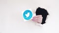 Twitter icon microblogging app hand breakthrough