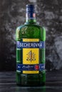 Kharkiv, Ukraine, November 15, 2019: A glass bottle of liqueur - becherovka on dark background. Strong drink. Illustrative editori