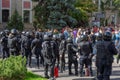 Kharkiv, Ukraine, September 2019 Police watching for striking crowds of people. Policemen in armored jackets, helmets and black