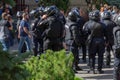 Kharkiv, Ukraine, September 2019 Police watching for striking crowds of people. Policemen in armored jackets, helmets and black