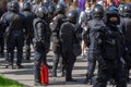 Kharkiv, Ukraine, September 2019 Police watching for striking crowds of people. Policemen in armored jackets, helmets and black