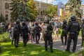 Kharkiv, Ukraine, September 2019 Police watching for striking crowds of people. Policemen in armored jackets, helmets and black