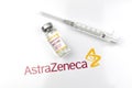 Kharkov, Ukraine - April 18, 2021: Astrazeneca vaccicne vial with logo and medical syringe, vaccination concept