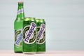 KHARKOV, UKRAINE - DECEMBER 8, 2020: Aluminium cans of green Tuborg beer on wooden background. Tuborg is Danish brewing company Royalty Free Stock Photo