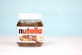 KHARKOV, UKRAINE - DECEMBER 27, 2020: Nutella classic glass can. Nutella is manufactured by Italian company Ferrero first