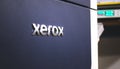 Kharkov, Ukraine - December 24, 2021: Xerox logo close-up. Large high volume printer in print house workshop