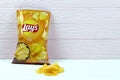 KHARKOV, UKRAINE - JANUARY 3, 2021: Lays potato chips with cheese flavour and original lays logo in middle of package. Worldwide Royalty Free Stock Photo