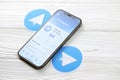 KHARKOV, UKRAINE - MARCH 5, 2021: Telegram Messenger icon and application from App store on iPhone 12 pro display screen on white Royalty Free Stock Photo