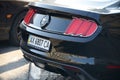 KHARKOV, UKRAINE - OCTOBER 20, 2019: Black 2015 Ford Mustang 50 Year Limited Edition rear view outdoors