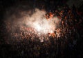 Kharkov, Ukraine - 07 October 2012: Football fans of Shakhtar team lit up the lights, flares and smoke bombs. Protest concept