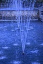 Kharkov, Ukraine. 2021, October 26. Movement of water jets in the fountain of the city autumn park, splashes and drops of water in