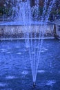 Kharkov, Ukraine. 2021, October 26. Movement of water jets in the fountain of the city autumn park, splashes and drops of water in