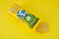 Tuc snack pack on bright yellow flat background