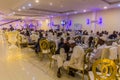 KHARTOUM, SUDAN - MARCH 8, 2019: Weddin guests in a hall in Khartoum, capital of Sud