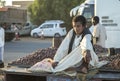 Sudanese boy selling dates at the roadside