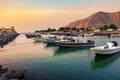 Khasab, Oman - October 5, 2018: Khasab city creek and desert rock scenery with houses at sunset Royalty Free Stock Photo