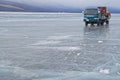 A truck on the frozen lake